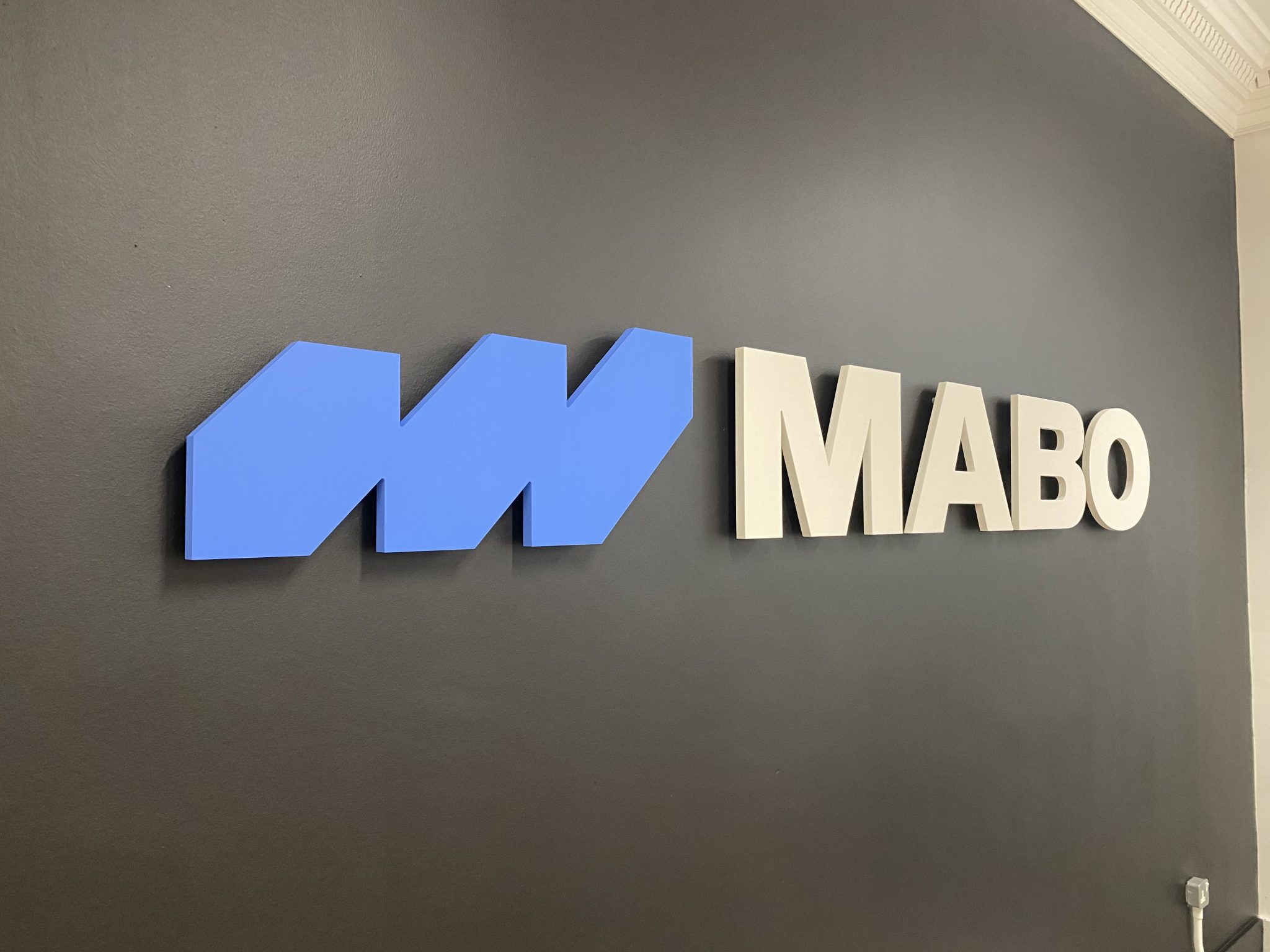 another photo of the new mabo wall signage. Made of 3d cut letters, the mabo logo is proudly displayed on this feature wall in the mabo office